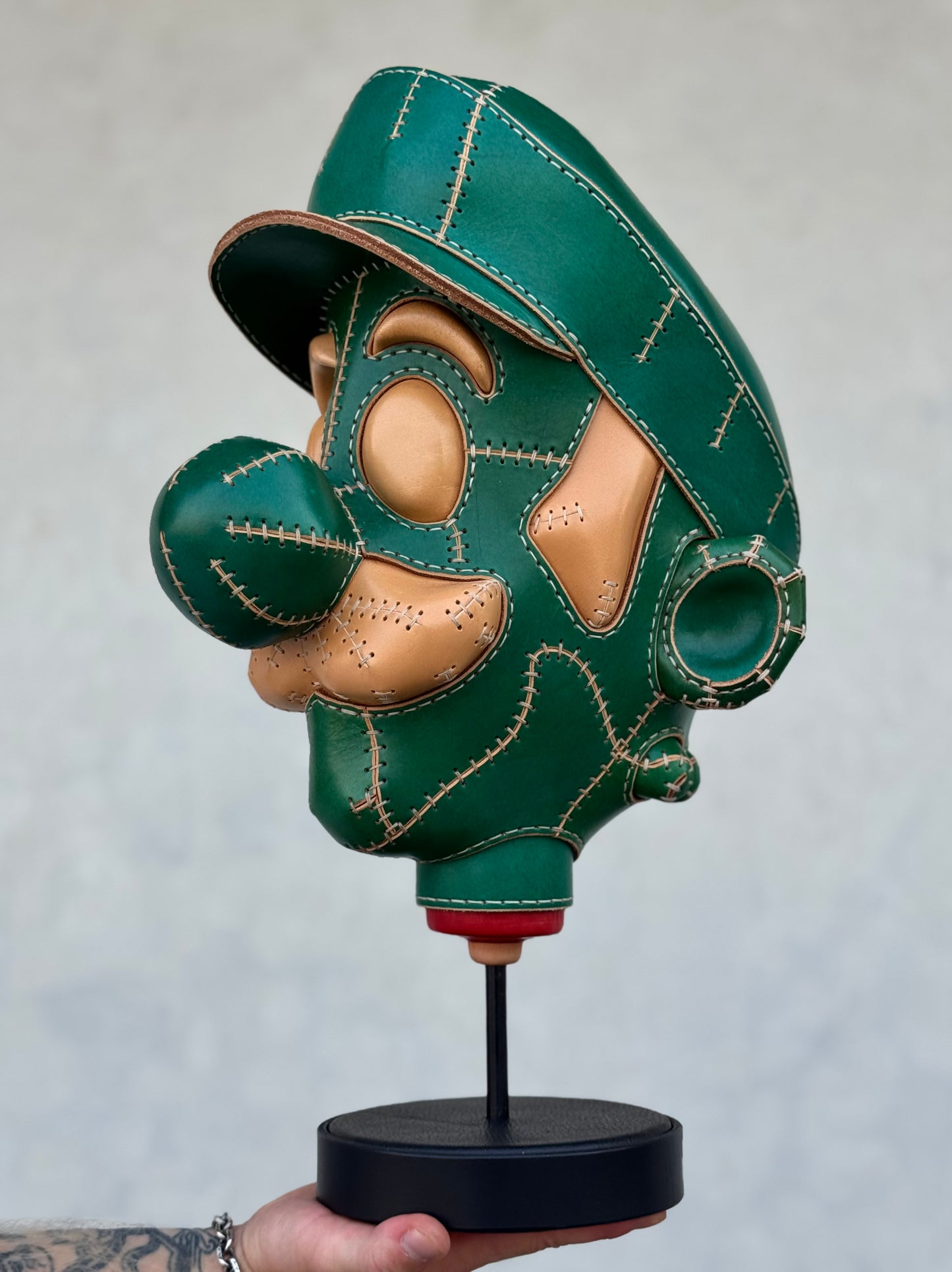 Green Character Head Leather Sculpture on Pedestal | Handmade Leather Art