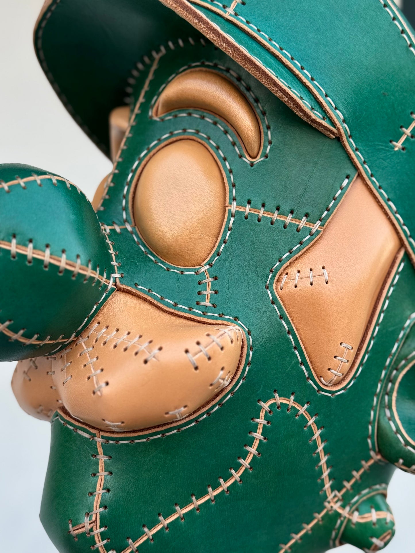Green Character Head Leather Sculpture on Pedestal | Handmade Leather Art