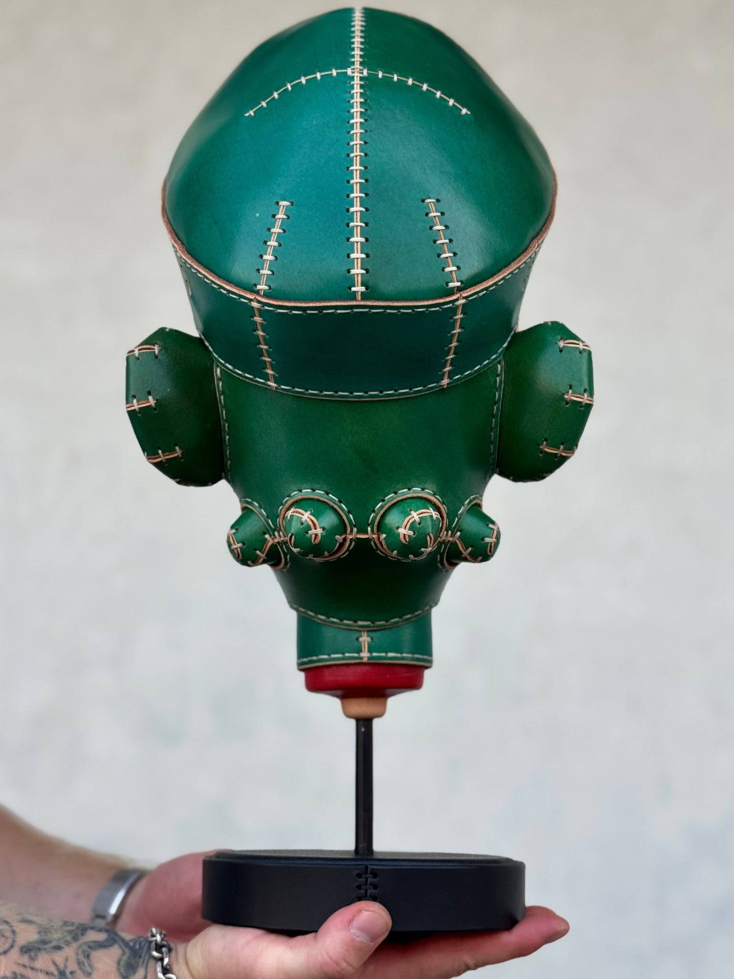 Green Character Head Leather Sculpture on Pedestal | Handmade Leather Art