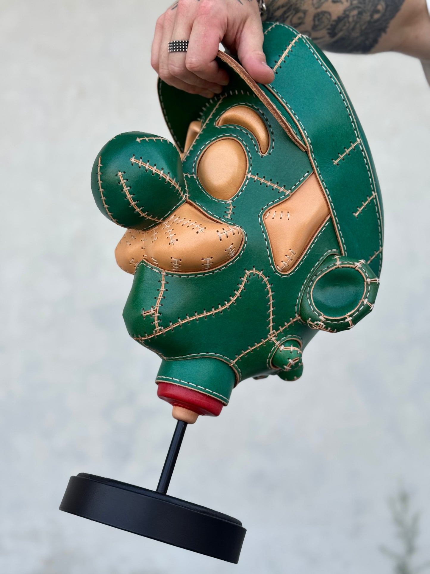 Green Character Head Leather Sculpture on Pedestal | Handmade Leather Art