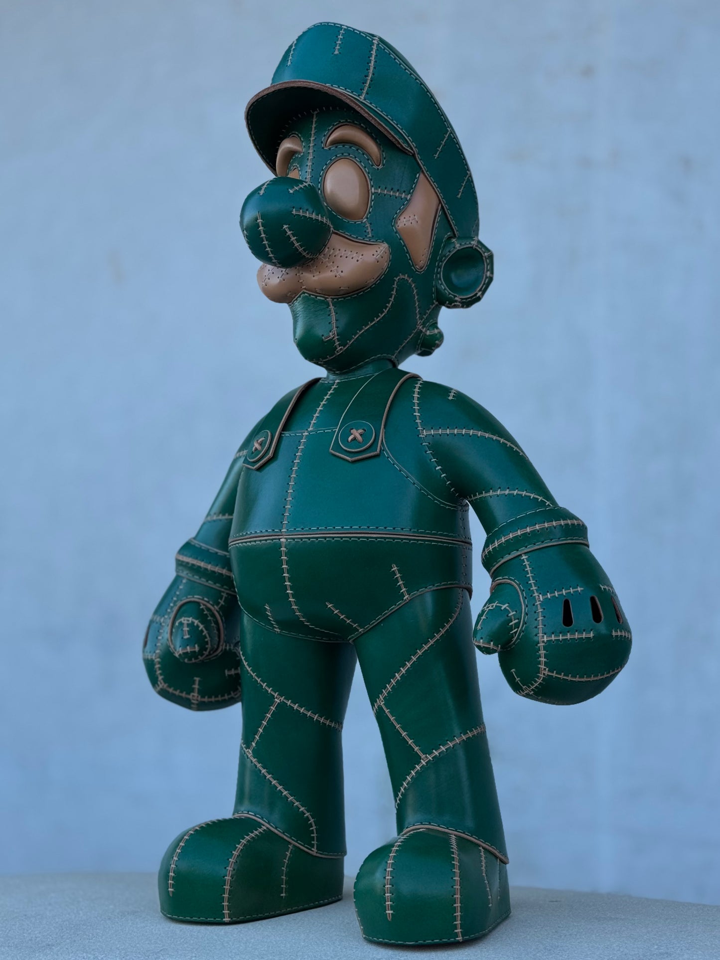 Green Plumber Character – Handmade and Hand-Painted Leather Sculpture