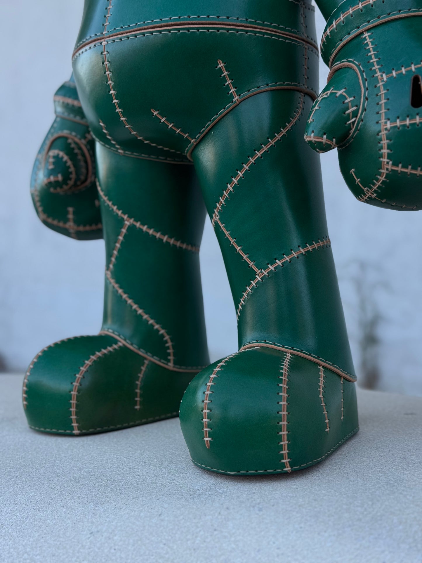 Green Plumber Character – Handmade and Hand-Painted Leather Sculpture