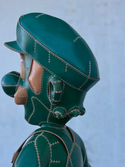 Green Plumber Character – Handmade and Hand-Painted Leather Sculpture