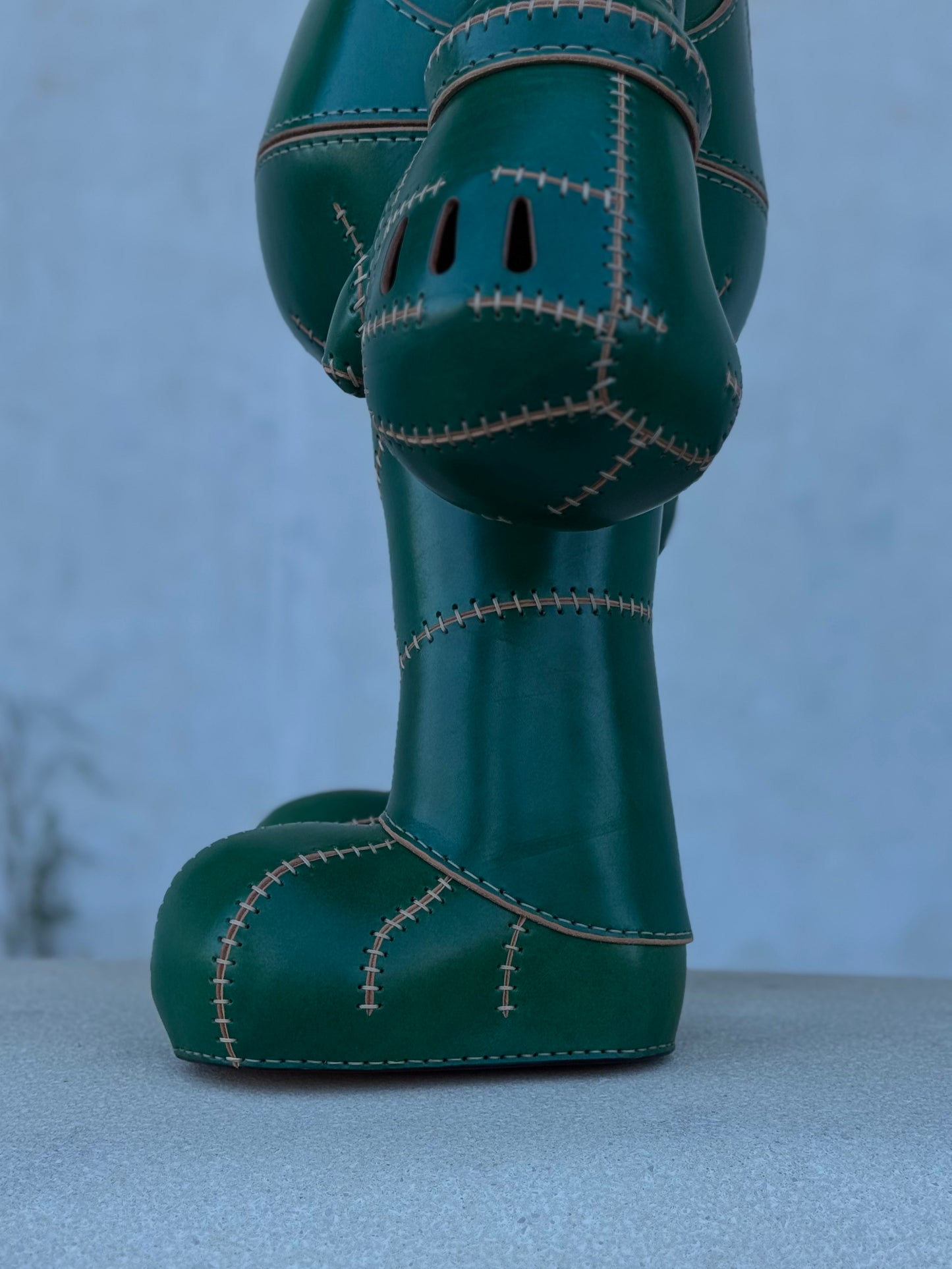 Green Plumber Character – Handmade and Hand-Painted Leather Sculpture