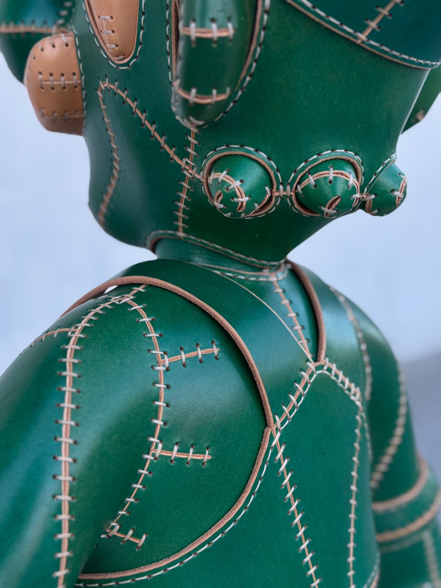 Green Plumber Character – Handmade and Hand-Painted Leather Sculpture