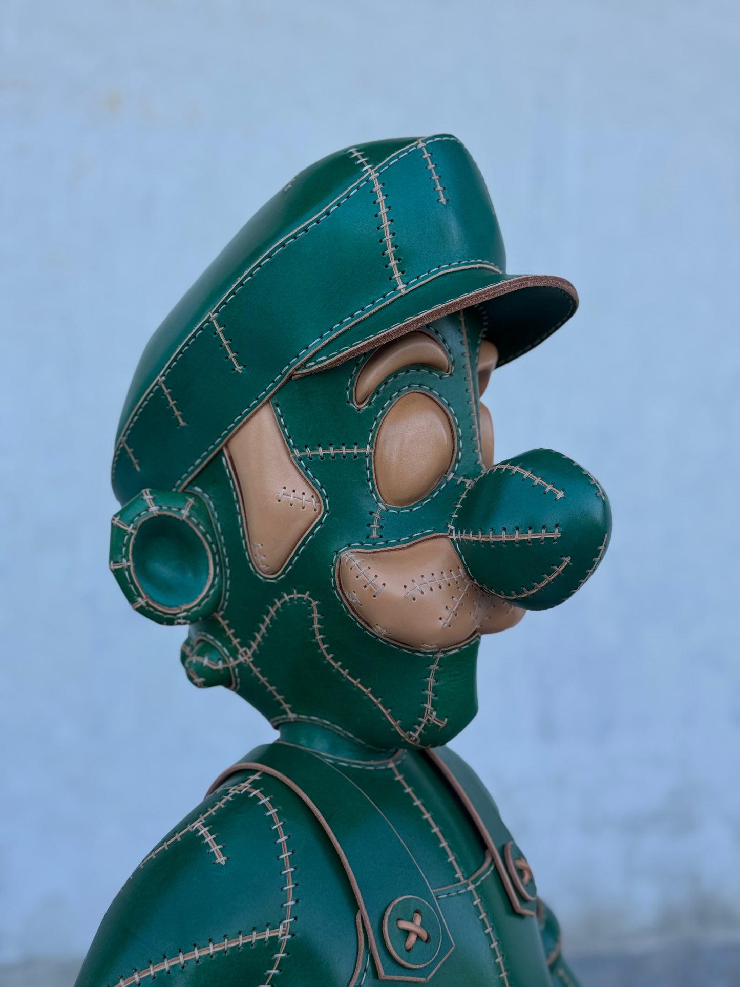 Green Plumber Character – Handmade and Hand-Painted Leather Sculpture