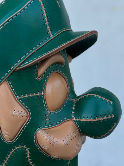 Green Plumber Character – Handmade and Hand-Painted Leather Sculpture