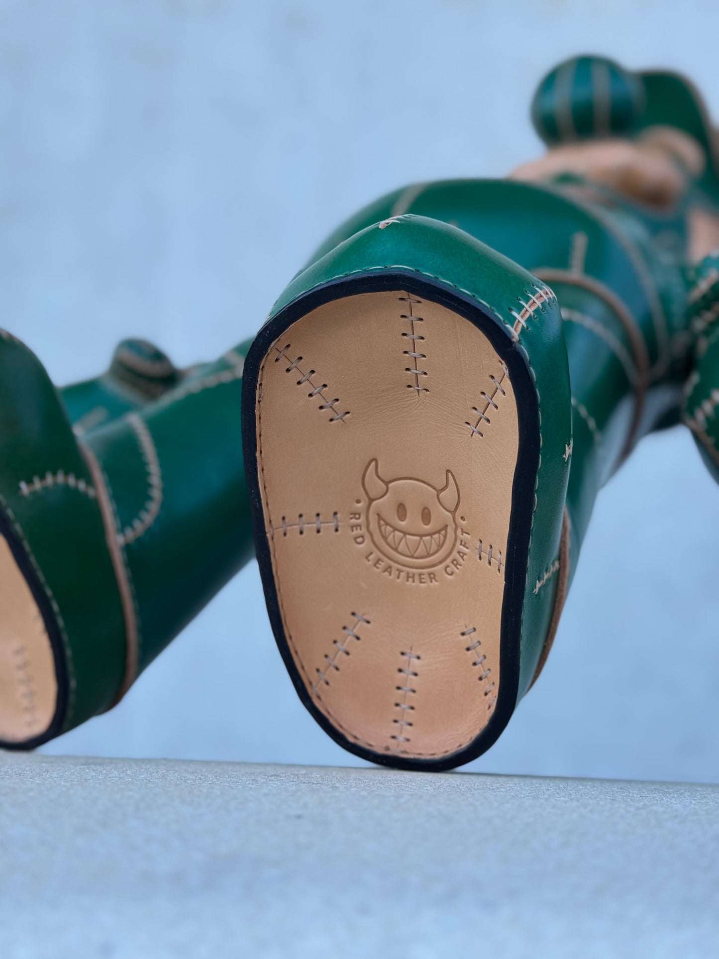 Green Plumber Character – Handmade and Hand-Painted Leather Sculpture