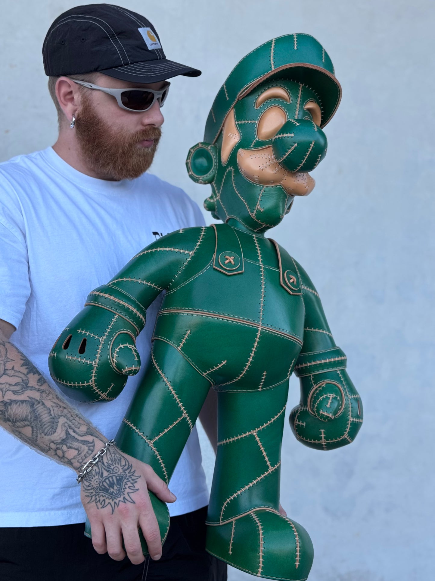 Green Plumber Character – Handmade and Hand-Painted Leather Sculpture